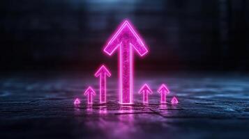 Pink neon arrow pointing up on a dark background photo