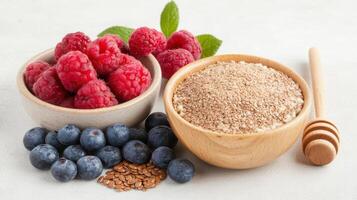 Raspberry powder, blueberries, and honey photo