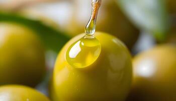 a close up of a drop of oil on a fruit photo
