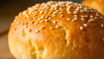 a close up of a bun with sesame seeds on it photo