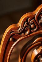 close up of a wooden chair with carvings on it photo