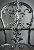 close up of a metal chair with a metal frame photo