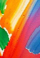 close up of a rainbow painted on a wall photo