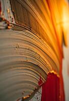 close up of a book with water droplets on it photo