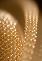 close up view of some beads on a table photo