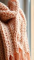 close up of a scarf on a window sill photo