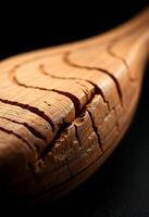 close up of a wooden object on a table photo