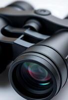 close up of a camera lens on a white surface photo