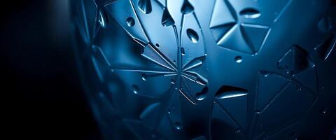 close up of a blue vase with a pattern on it photo