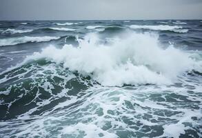 large body of water with waves coming in photo