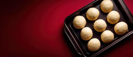 Baking fresh dough balls kitchen food photography cozy atmosphere top-down view culinary preparation photo