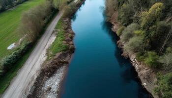 Environmental impact of sewage leak into river aerial view nature scenic landscape photo