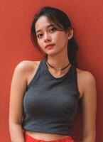 Stylish asian woman posing urban setting portrait photography colorful background vibrant atmosphere photo