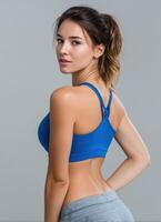 Fitness inspiration active woman posing studio background lifestyle photography motivational viewpoint photo