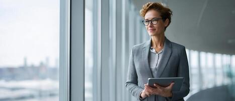 Confident administrative manager in modern office professional portrait bright environment empowering viewpoint photo