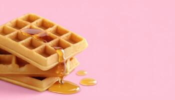 Delicious golden brown waffles with syrup closeup shot food photography pink background gourmet concept photo