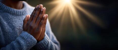 Meditative gesture of hands together outdoor setting closeup image soft lighting spiritual concept photo