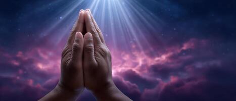 Prayer pose hands against ethereal background spiritual moment introspective mood close-up perspective photo