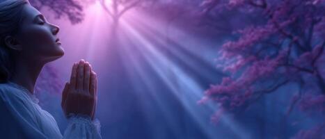 Praying figure in serene forest spiritual atmosphere ethereal light tranquil nature scene photo