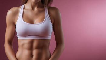 Fitness model showcasing slim body in pink background lifestyle image studio environment close-up view photo