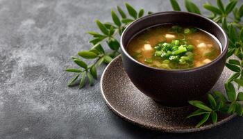 Miso soup with fish flakes and herbs japanese cuisine food photography cozy setting top view deliciousness photo