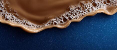 Artistic display of cold brew coffee splash blue background beverage photography abstract environment close-up view photo