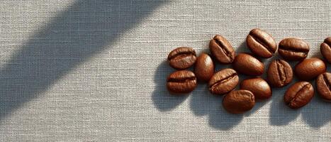 Artistic coffee bean arrangement on linen cloth still life photography natural light subtle textures photo