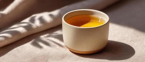 Relaxing moment with a simple white tea cup cozy home setting closeup photography photo