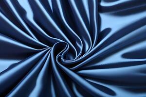 Elegant swirls of blue satin create a textured fabric that embodies sophistication and beauty. The rich hues and smooth finish come together to offer a stunning visual appeal. photo