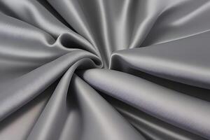Abstract Texture of Flowing Blue Satin Fabric This work delves into the mesmerizing abstract texture of flowing blue satin fabric. The way light dances across its smooth surface, casting playful photo
