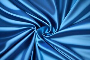 Abstract Texture of Swirling Blue Silk Fabric photo