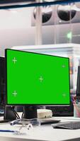 Vertical Chroma key display on PC in photovoltaics factory used to oversee production line, analyzing data and reviewing system metrics. Computer in solar panels plant, work on renewable energy. video