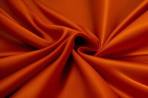 Abstract Swirling Orange Silk Fabric Texture. photo