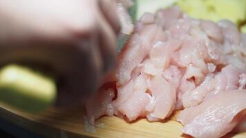 Preparing fresh chicken for a delicious meal in the kitchen video