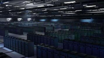 Equipment in dimly lit server room managing computing resources essential for big data analytics. Mainframes in data center storing information for predictive maintenance, aerial sahot video