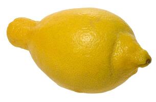 Whole lemon with a yellow, textured peel and a small stem, isolated background. Fruit has an elongated shape. photo