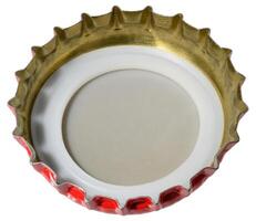 Inner side of a red metal beer cap with a white plastic liner. Top view, isolated background photo