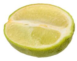 Close-up of a fresh lime wedge with juicy pulp and a bright green peel photo