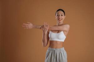 Beautiful, fitness woman is in the studio photo