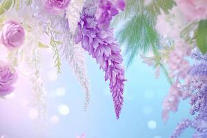 Close up of a fancy floral decor with wisteria, rose, fern against a dreamy, bokeh filled background photo
