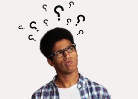 Confused Afro Guy Has Too Many Questions and No Answer, White Background photo