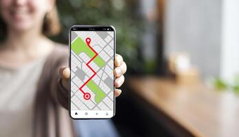 Smartphone With Opened Gps Navigation Online Maps On Screen In Female Hand. Unrecognizable Woman Using Modern Application For Planning Routes And Location Tracking, Creative Collage photo