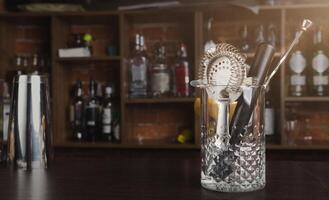 Bartender tools. Set of accessories for making cocktails on bar counter, copy space photo