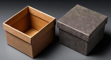 Two elegant gift boxes sit side by side, one in a warm brown and the other in a sleek gray. They are perfect for wrapping presents and ready for delivery during the festive season. photo