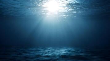 Bright sunlight penetrating deep ocean water, casting soft beams on an expansive empty ocean floor with ample blank space photo