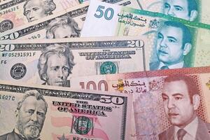 Stack of US Dollar and Moroccan dirham photo