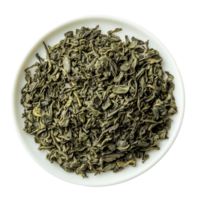Dried green tea leaves arranged neatly in a transparent plate on a clean transparent surface emphasizing their texture and color, dry green tea in plate on transparent background png