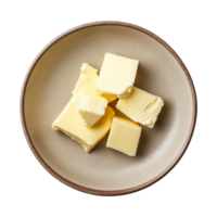 Freshly cut butter pieces neatly arranged on a plate against a clean transparent background for culinary use, butter in plate on transparent background png