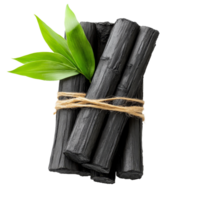 Bamboo charcoal sticks tied with twine and green leaves on a transparent background, Bamboo charcoal isolated on transparent background png