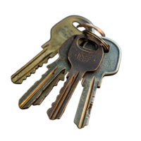 House keys lying on a dark surface with a subtle reflection capturing their detailed design, House Keys png